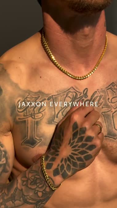 Gold JAXXON chain and bracelet in sunlight