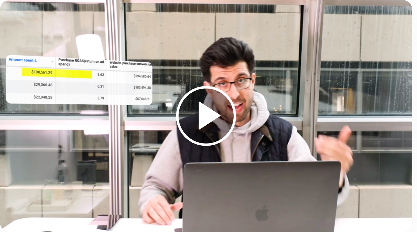 Paul Klebanov explaining Facebook hook rate at his desk